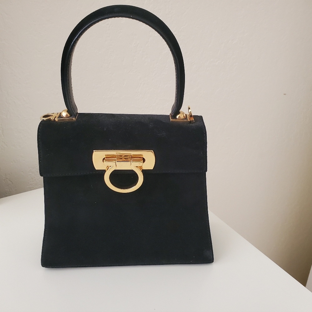 Elegant Black Handbag with Gold Accents
